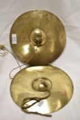 A pair of early 20th century musical cymbals.