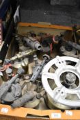 A box full of early 20th century blow torches and camping gas stove.