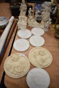 A selection of 19th century parion ware plaques and figurines having classical design, inclduing