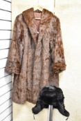 A vintage squirrel fur coat, and a fur hat, medium to large size.