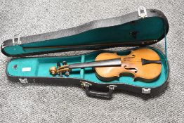 A traditional violin, of small proportions (child size) , unlabelled two piece back of approx. 11