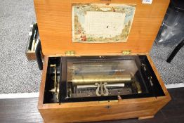 A 19th Century mahogany cased music box , 12 airs