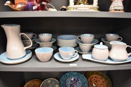 An Art Deco style Poole Pottery C104 pattern part tea and coffee service.