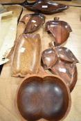 Six mid century style wooden carved dishes and bowls including leaf designs.