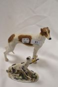 Two sporting dog animal studies including a Capodimonte signed Erter and a Border fine arts