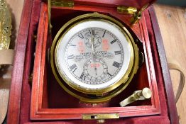 A modern Joseph Sewill gimballed clock in a dual lid no. 21328, in a mahogany case with brass