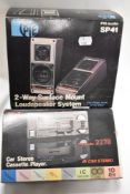 A vintage new old stock Pye 2278 Car stereo cassette player with a Pye SP41 two way speaker system.