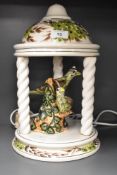 A mid century Derek Fowler pottery lamp in the form of a garden pagoda.