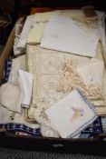 A selection of early 20th century and later table settings and place mats, including embroidered and
