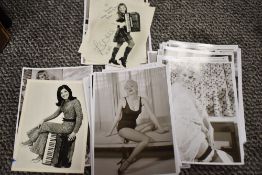 A collection of modern photographs of vintage burlesque and erotic models.