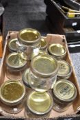 A collection of vintage Kilner kitchen storage jars.
