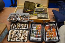 A good selection of salmon and trout flies in various pocket boxes