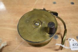 A 4 inch Mallochs patent brass fishing reel ' C Harlow Strand London' bearing the initials JHH