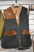 A Maine sleeveless quilted jacket and an over shooting jacket size medium