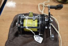 An Abu Garcia Ambassadeur 7000c Reel.