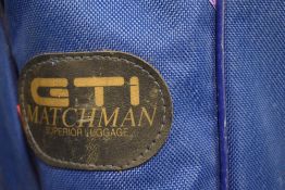 A Matchman 4 rod carry case containing a selection of telescopic rod rests and a landing net along