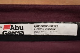 An Abu Garcia 3pc 11ft conolon 800 carbon composite quiverite 8110 916120 in soft sleeve and plastic