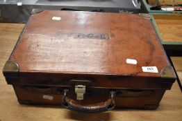 A Leather and brass cartridge box with internal leather lifting staps Retail Label 'Harrods Ltd