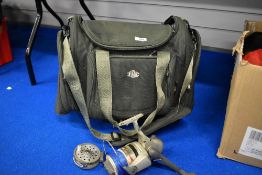 A fishing Holdall marked JRC containing a spinning and flyreel