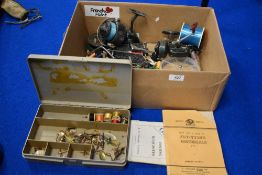 A selection of vintage fishing tackle including fly reels,spinning reels, lures and flies, A fly
