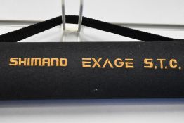 A Shimano 5pc 2.7m Exage s t c fishing rod in original sleeve and zipped canvas tube