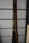 Two Vintage boat fishing rods one unmarked and a Shakespeare seamaster 1406 with a Daiwa Sealine