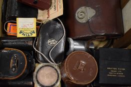A box of camera and photography accessories including filters and light meters etc