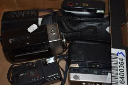 Four vintage photographic cameras including Olympus and Fuji also a Halinamatic super 8mm camera.