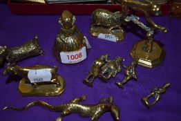 A selection of miniature brass animal and figure ornaments.