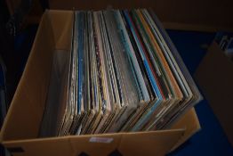 A mixed lot of vinyl LP records, including easy listening, rock and more.