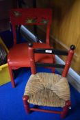 Two vintage child's chairs both painted in gloss red.