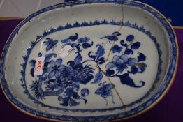 An 18th century Chinese porcelain serving dish having blue and white decoration with historical