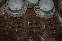 AN Alfred Meakin teapot and stand, a floral jug and three Mintons cup and saucers pattern no.3385,