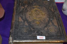 A large Victorian John Brown Family bible bound in leather.