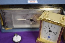 A Seth Thomas Quartzmatic mantel clock, a brass effect carriage clock inscribed '100th Anniversary
