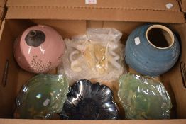 Four lustre oyster shell dishes in green and a similar lustre floral dish, a pair of glass butterfly