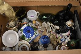 A collection of decorative display items including a Willow Tree study 'Guardian Angel', a Bing &