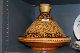 A Moroccan style tajine with decorative design.