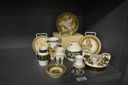 A selection of vintage Jersey Pottery hand decorated in various designs.