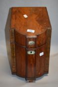 A Georgian Mahogany knife case with inlaid leaf design and a fitted interior.