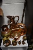A collection of copper wares including two large water jugs, bed warmer and stove kettle.
