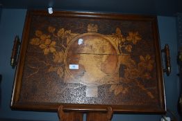An Arts and Crafts butlers tray with a poker worked image of an Art Nouveau lady. 57cm wide.