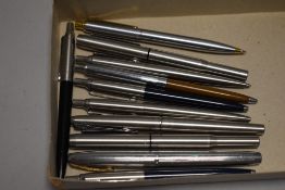 A collection of modern ball point and ink pens including Parker and Schaeffer.
