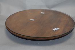 A Peter Hall of Staveley Yew wood lazy Susan 40cm wide, in very fine condition.