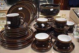 A vintage Denby brown glazed part tea and dinner service.