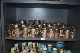 A shelf full of Art Deco silver plated tea water and coffee pots ideal for bed and breakfast.