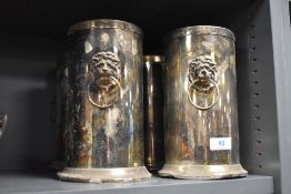 Four silver plated wine or champagne coolers with lion head handles.