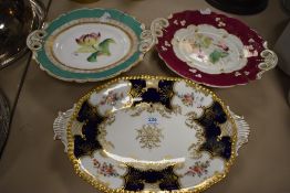 Two antique porcelain footed dishes with hand painted designs and a Coalport Imari dish.