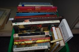 A box of vintage sewing craft and haberdashery related text and reference books.