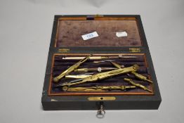 A late Victorian Geometry set in a mahogany case.